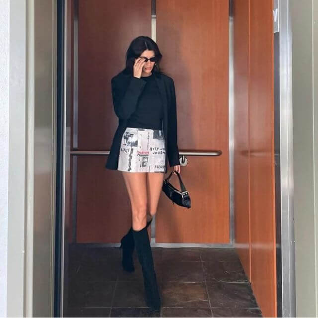 Clarissa - Off-the-shoulder playsuit with newspaper print-DESTINY