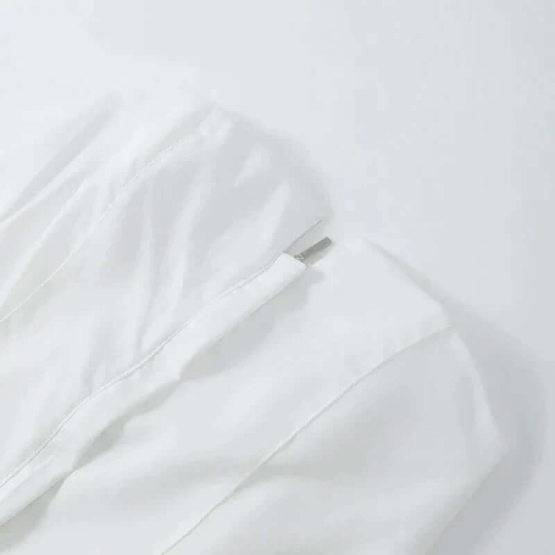 Mila - Structured, strapless top with peplum-DESTINY