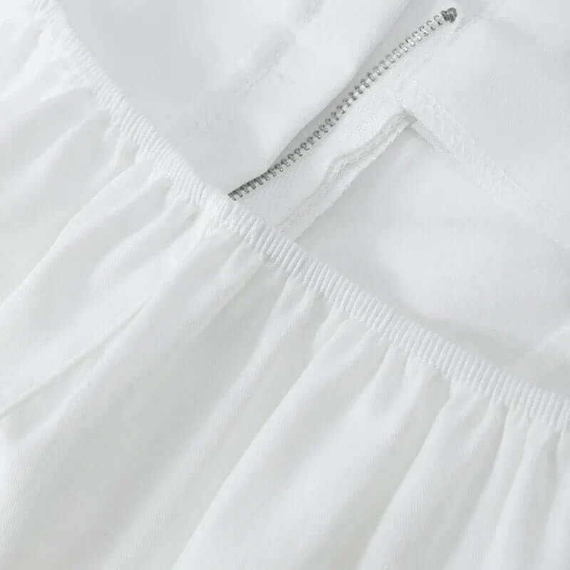 Mila - Structured, strapless top with peplum-DESTINY